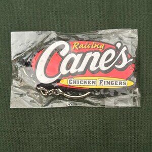 NIP Raising Cane's Silvertone Chicken Fingers Logo Keychain New In Package